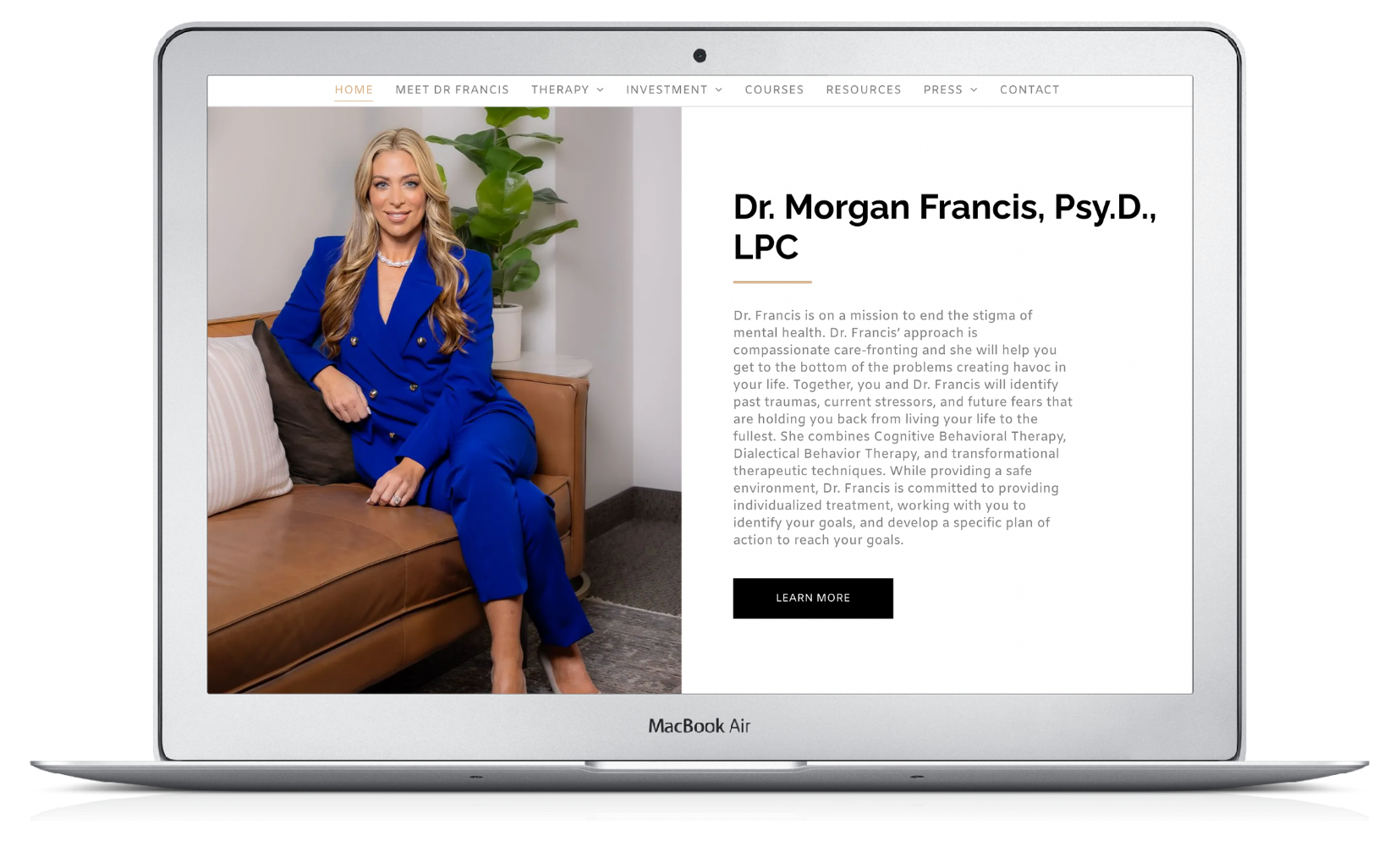 Website on a laptop showing a portrait and bio for Dr. Morgan Francis, Psy.D., LPC
