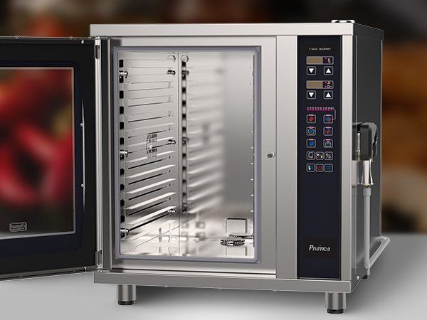 Un horno de convección de acero inoxidable con la puerta abierta.