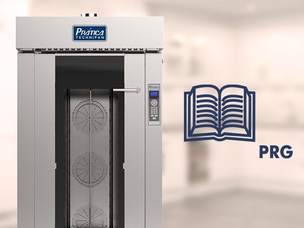 Un horno de acero inoxidable al lado de un libro que dice prg