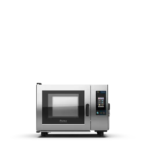 Un horno microondas de acero inoxidable está sobre una superficie blanca.