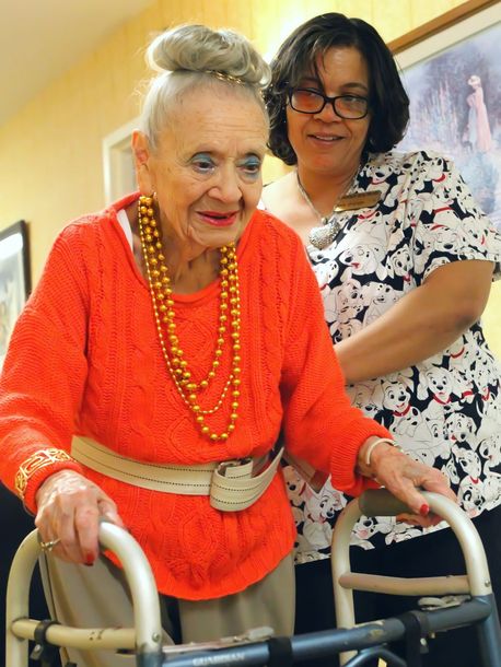 Caregiver assisting a resident at Newburgh Health and Rehab