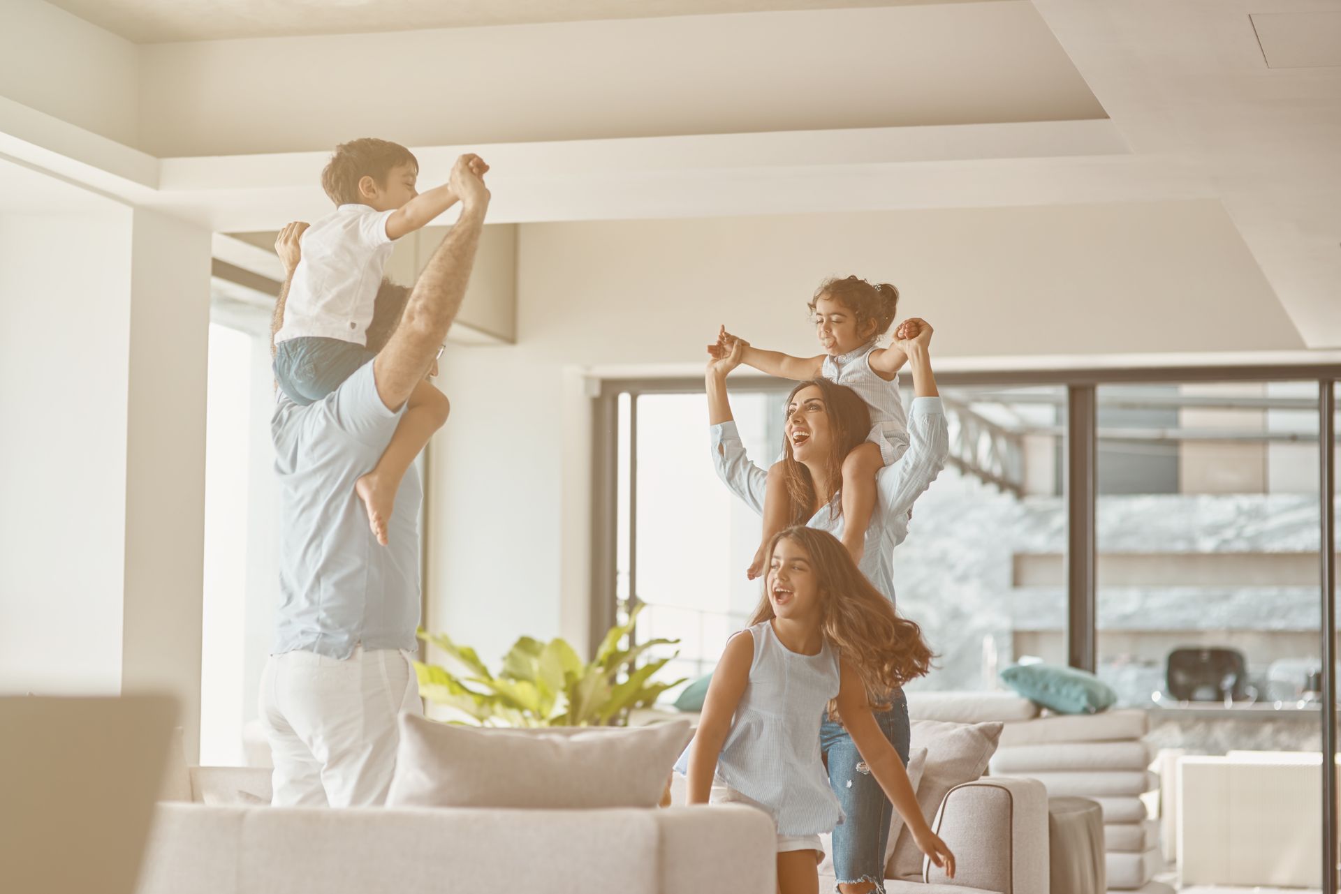 a happy family after hiring a house cleaning service in Plano