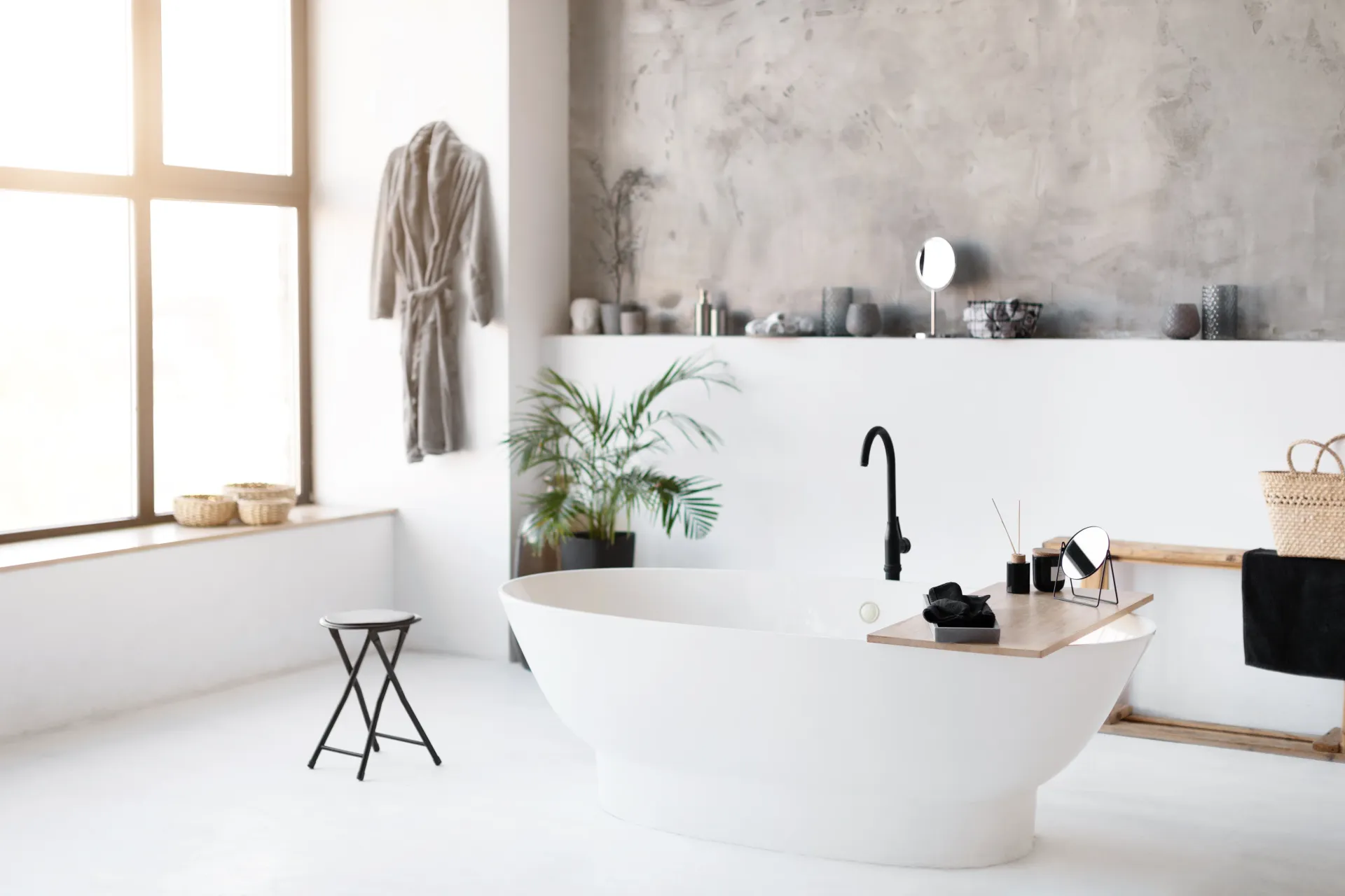 Minimalist bathroom with freestanding tub ready for bathroom cleaning services