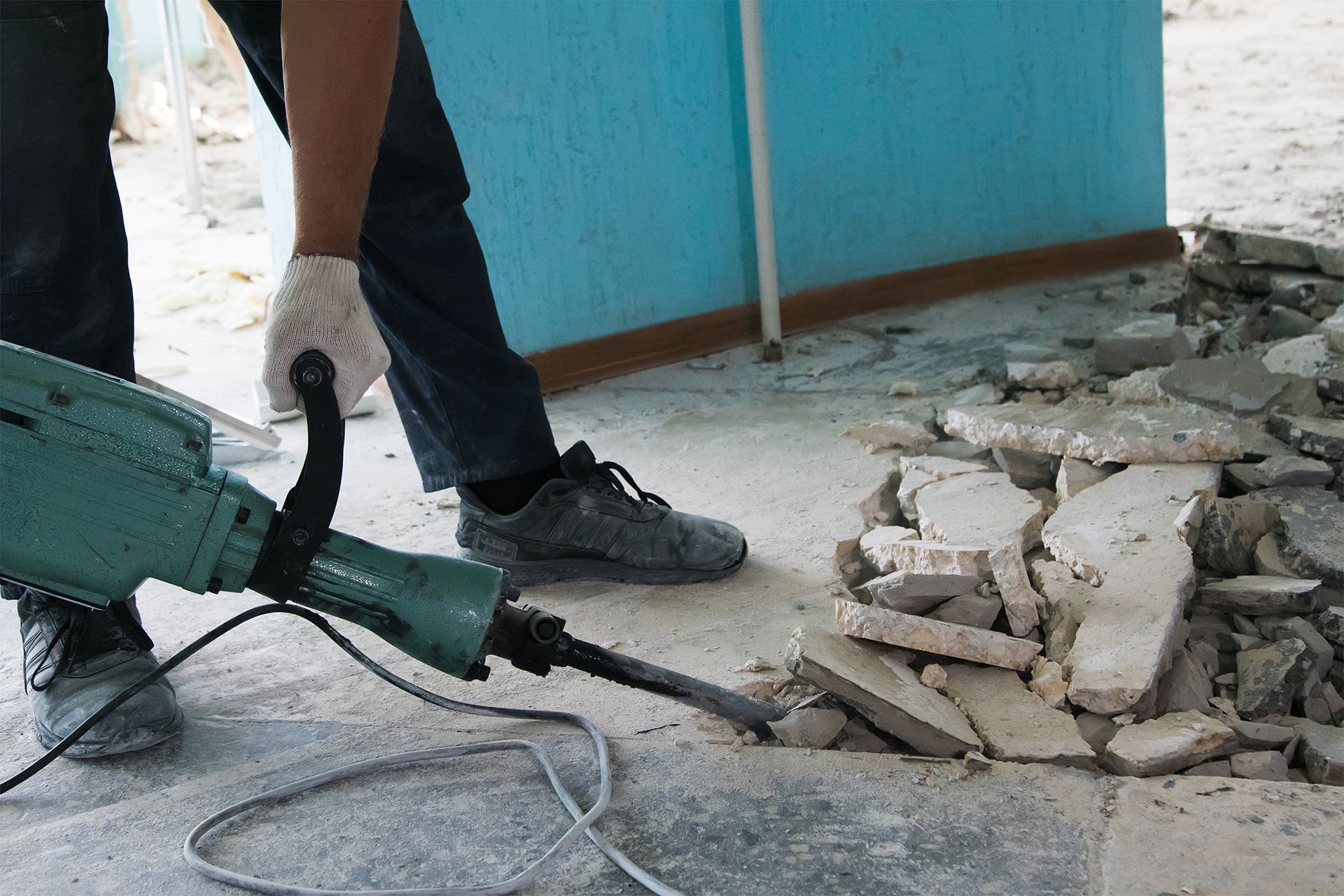 Breaking Concrete Floor With Jackhammer