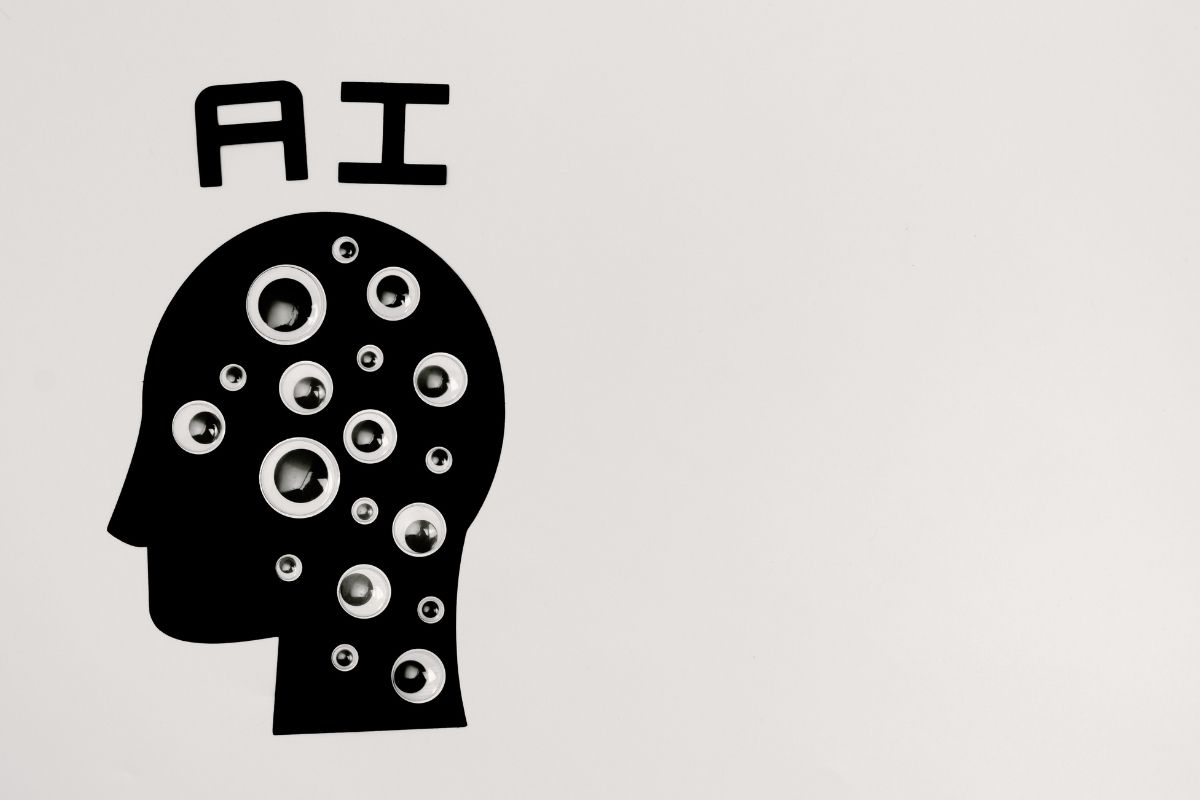 Abstract illustration of AI with silhouette head full of eyes, symbolizing AI in the franchise industry