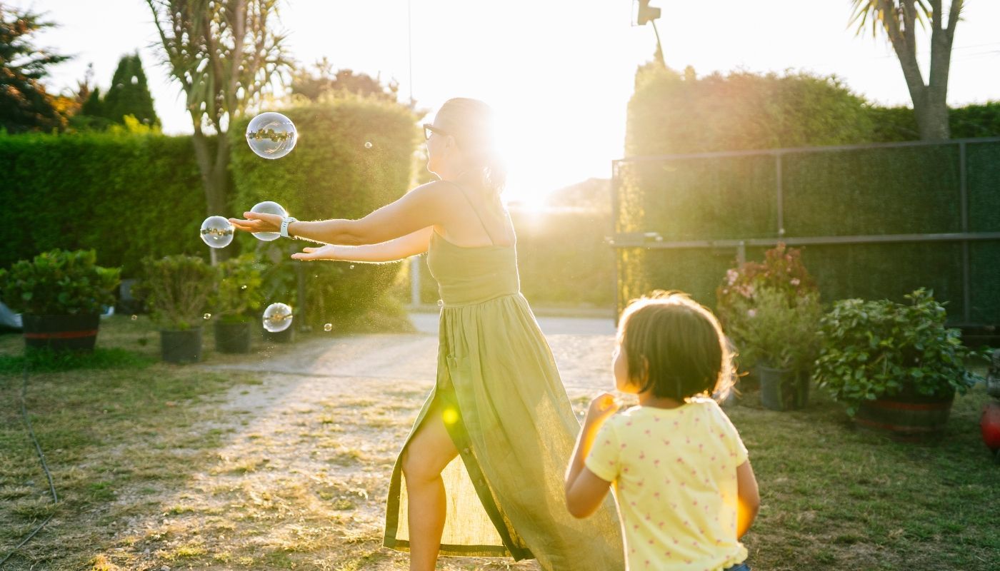 Child playing with her mother in a family-friendly business