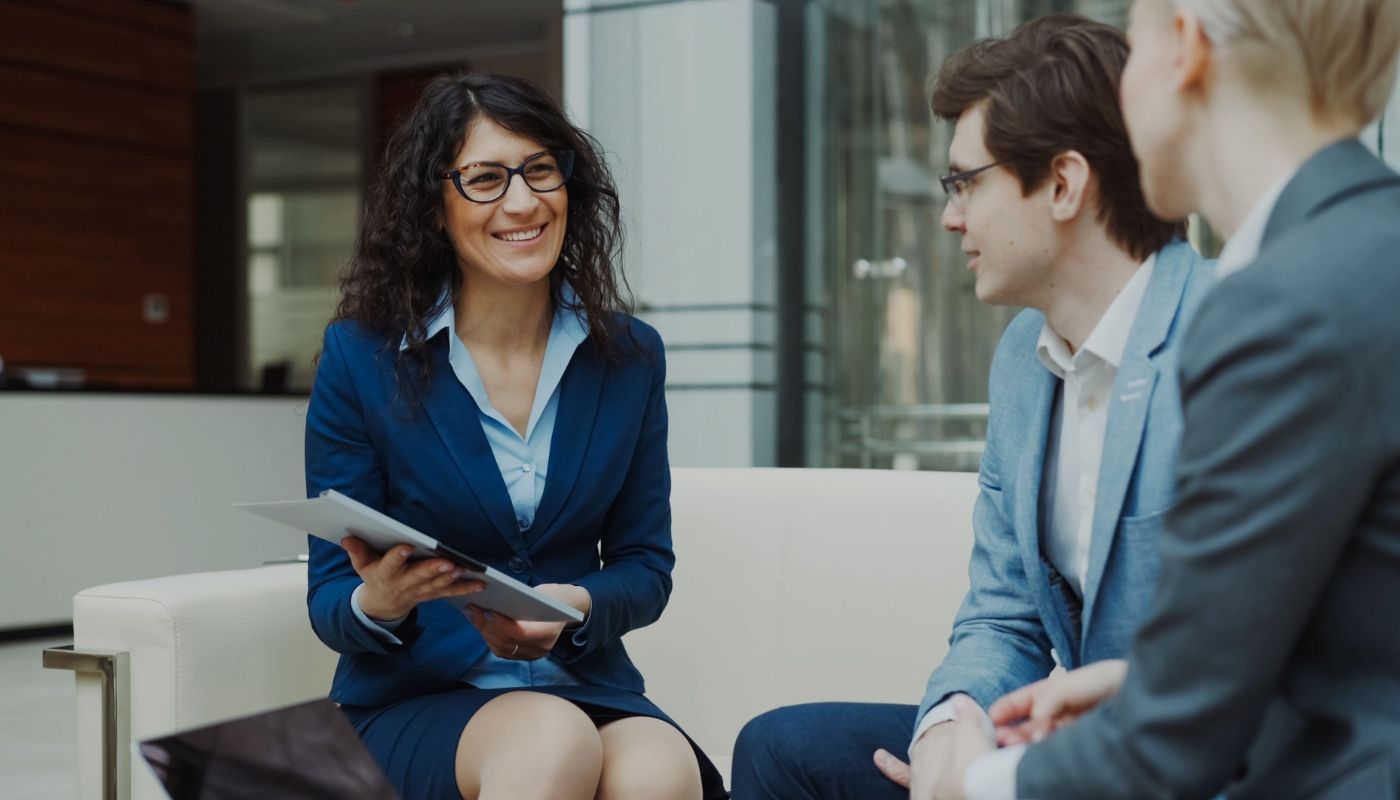 A franchise advisor meeting with prospective franchise owners