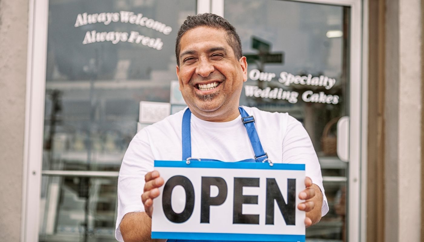 Smiling man holding an 