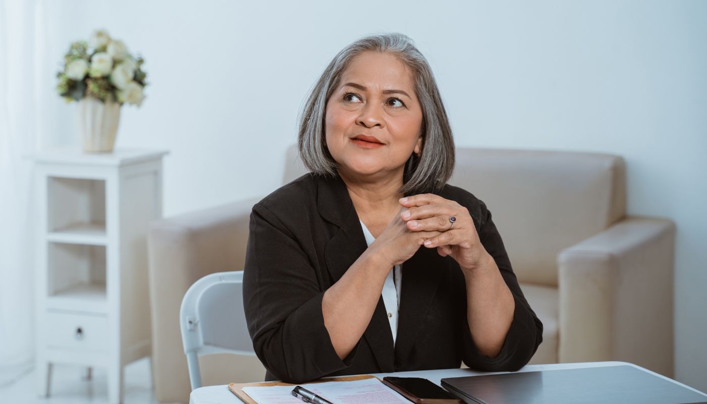 Confident senior businesswoman who wants to own a franchise in retirement