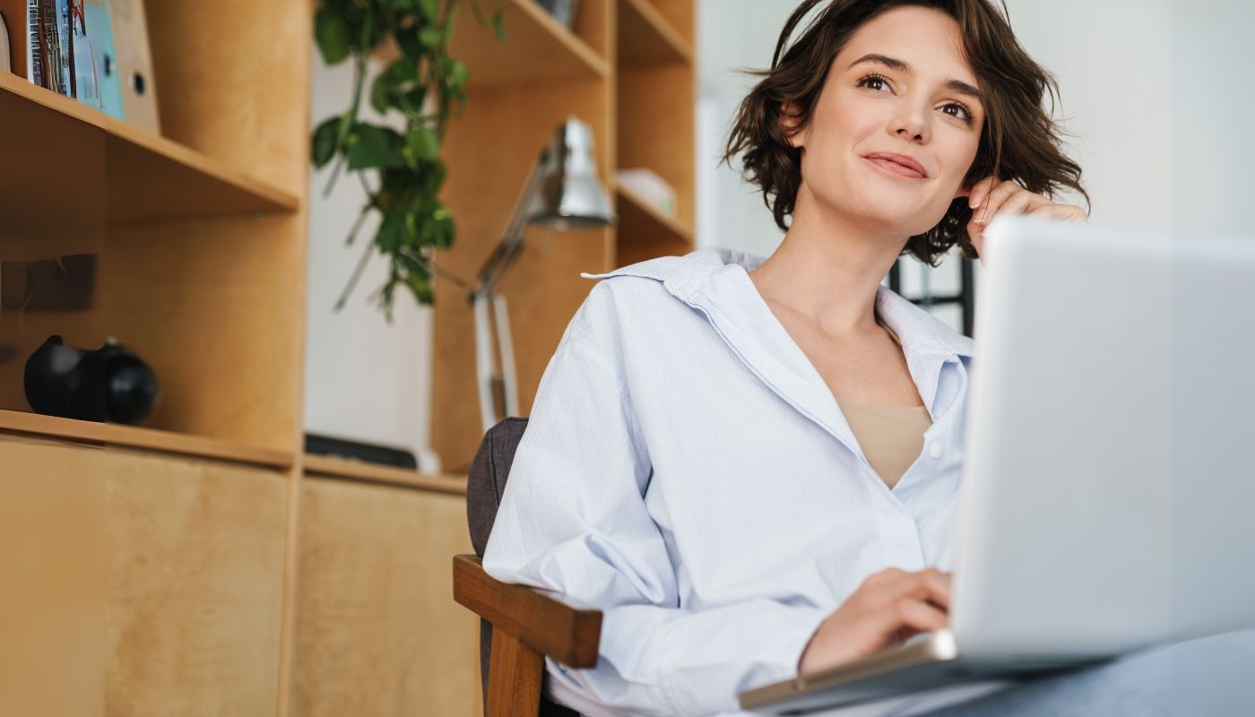 Young entrepreneur thinking about starting a semi-absentee franchise business