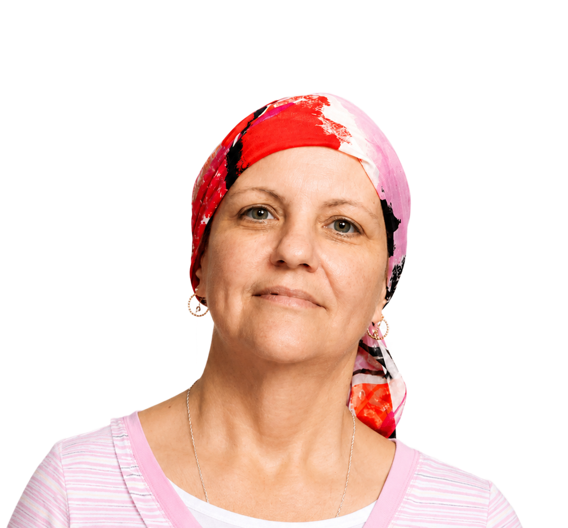 Profile view of a woman with an elegant updo and peach textured top against a white background
