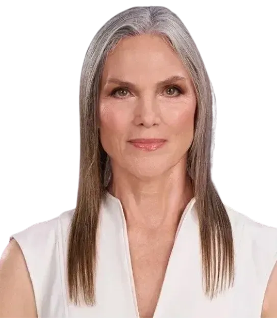 Portrait of a woman with long gray hair wearing a white sleeveless top on a white background