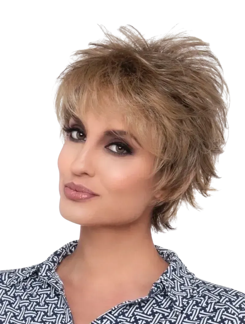 Portrait of a woman with short tousled blonde hair and smoky eye makeup on a white background