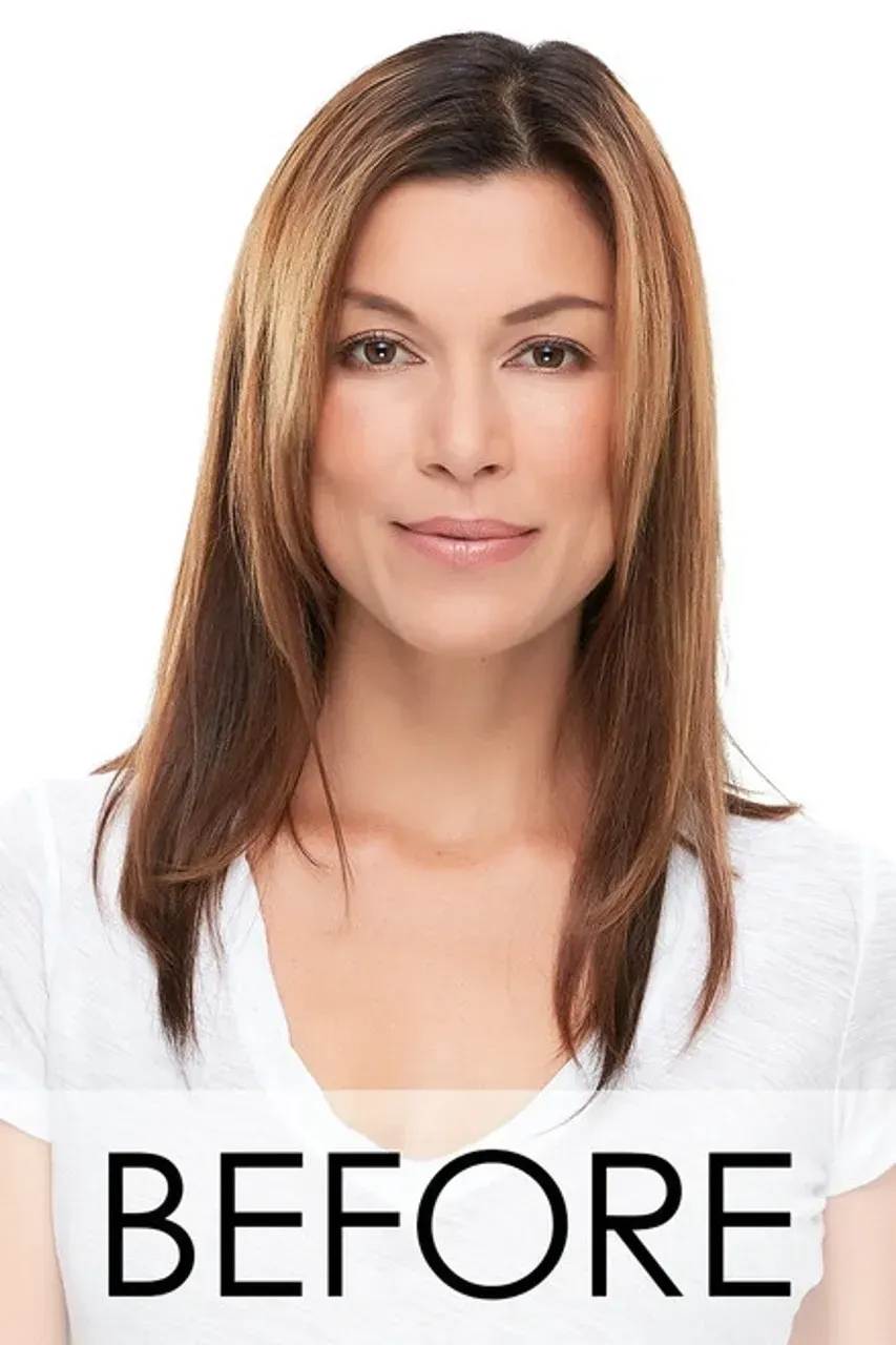 Portrait of a woman with long brown hair on a white background.