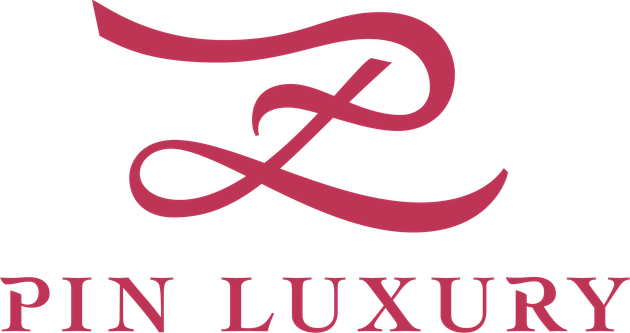 酒紅色風格化的「Z」字母組合圖案,上方為「PIN LUXURY」字樣。
