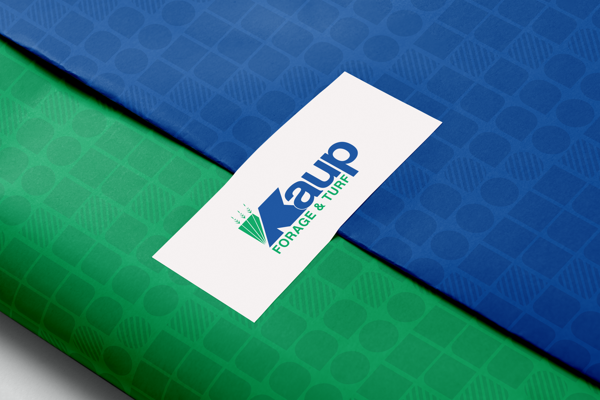 Blue and green turf with a white label reading