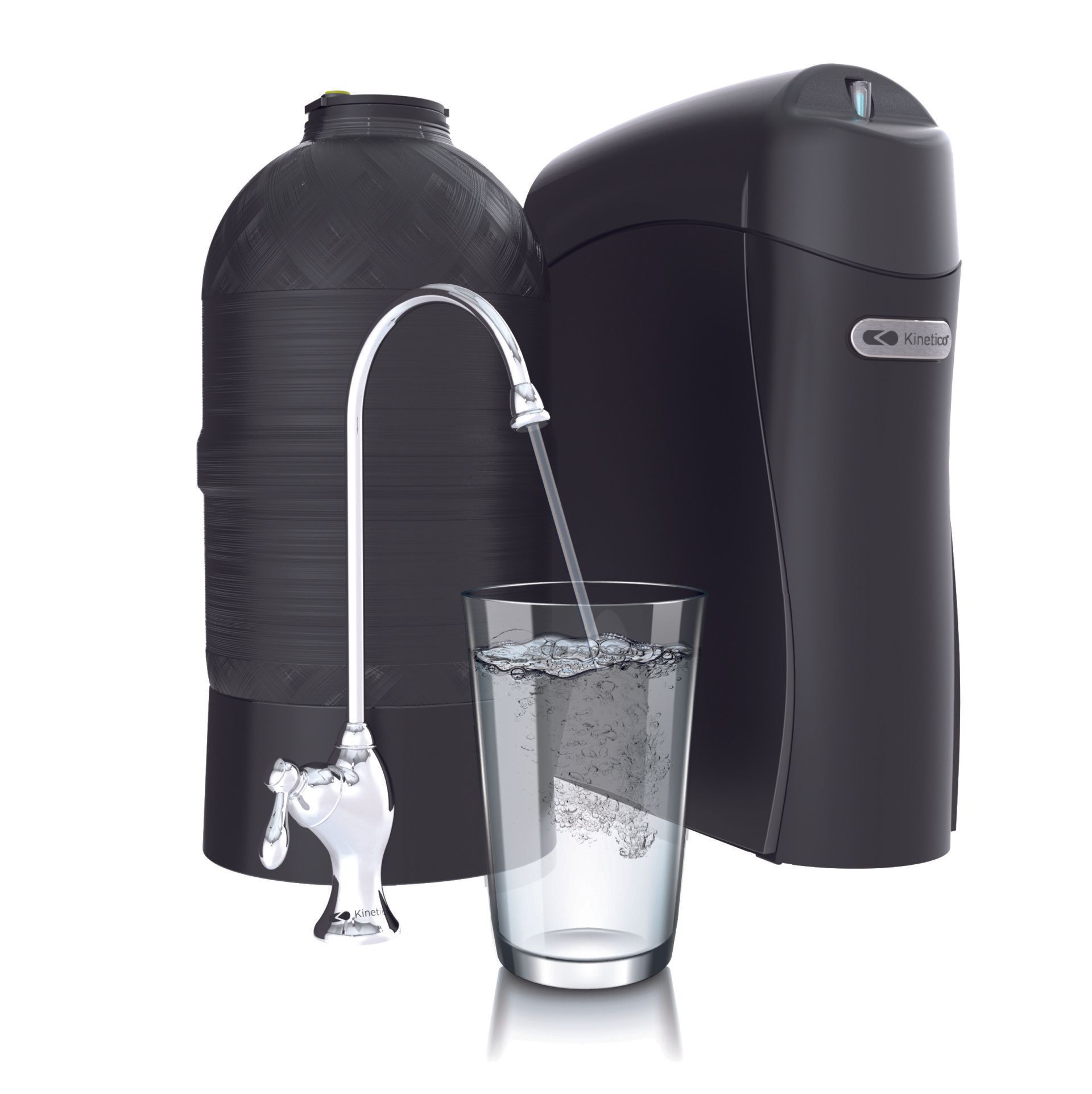 A glass of water is being poured into a water filter