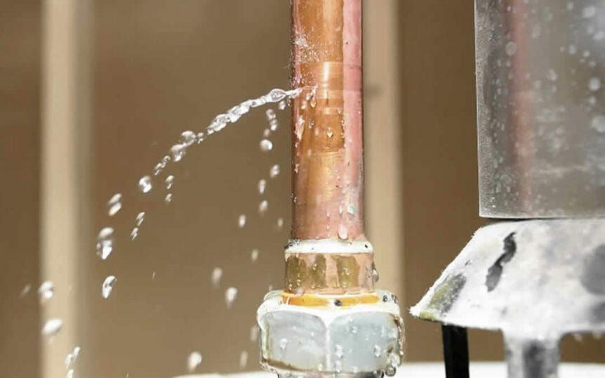 Leaking water from a pipe.