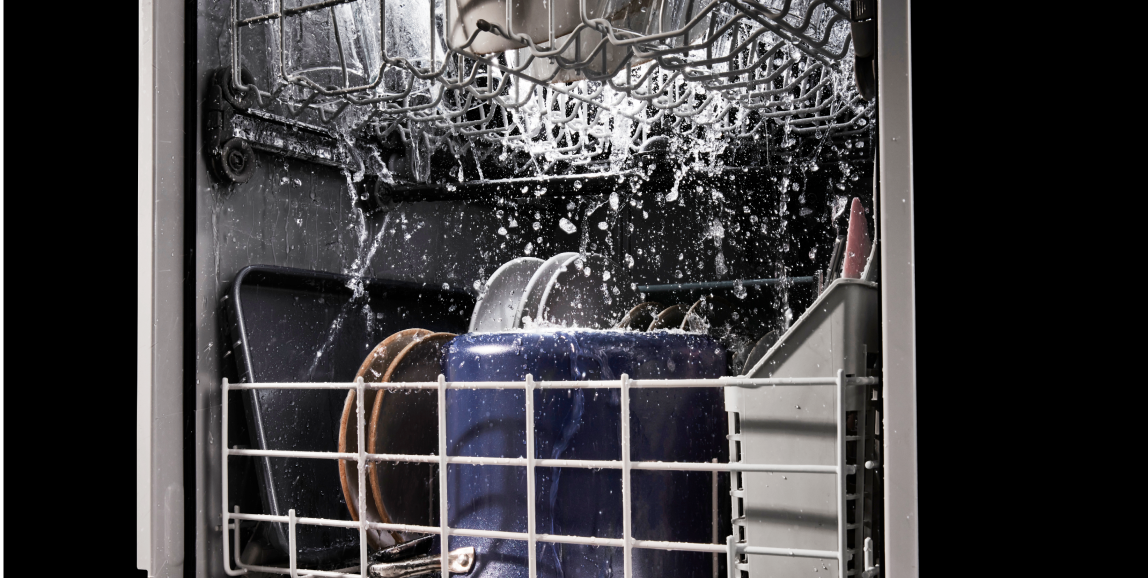 A picture of a running dishwasher.