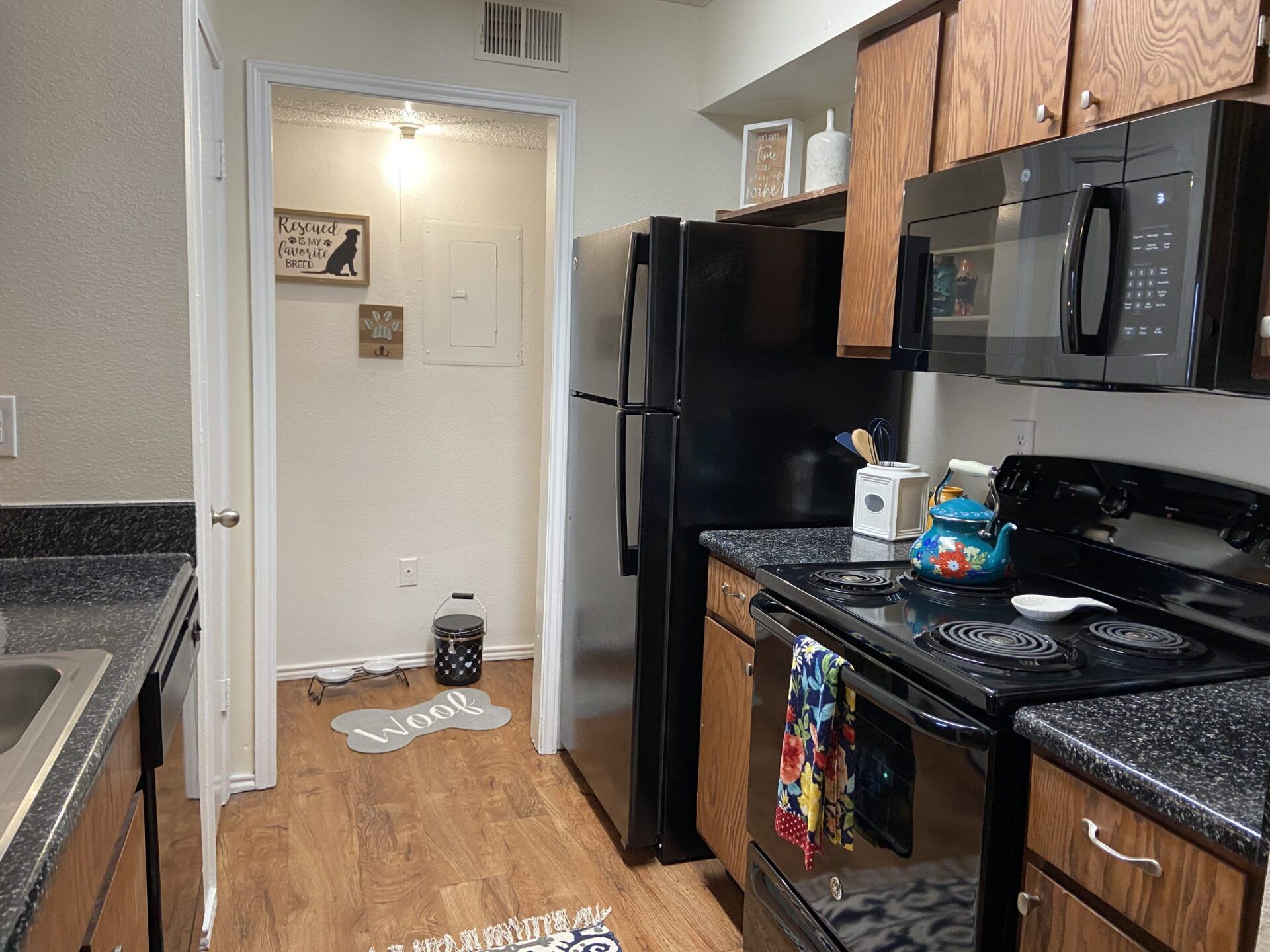 Interior of kitchen with appliances and wood cabintery
