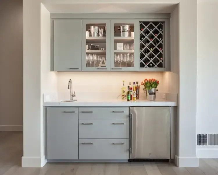 A kitchen with a wine rack and a sink