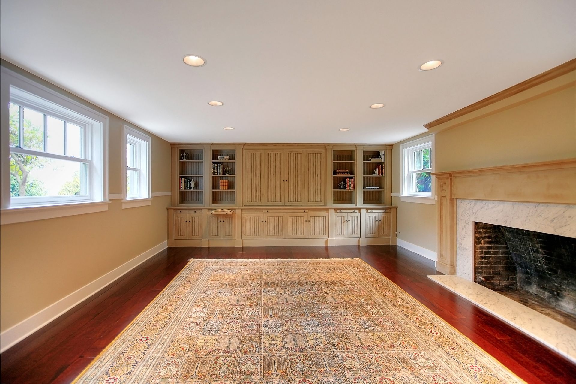 There is a fireplace in the middle of the room.