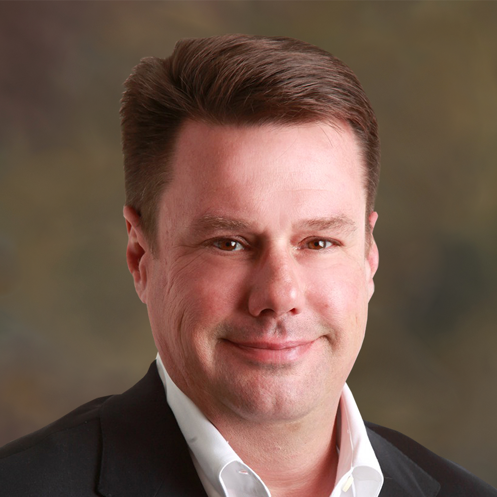 Headshot of Travis Oliver