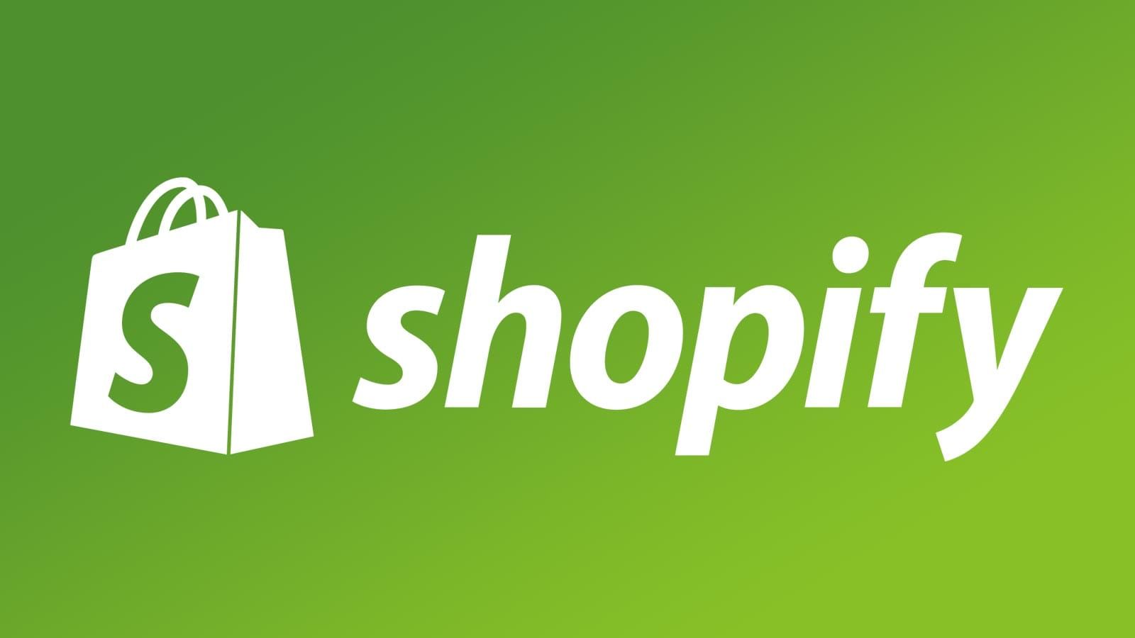 Het shopify-logo in het wit op een groene achtergrond.
