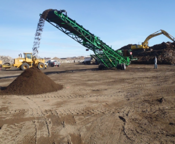 large machine digging dirt
