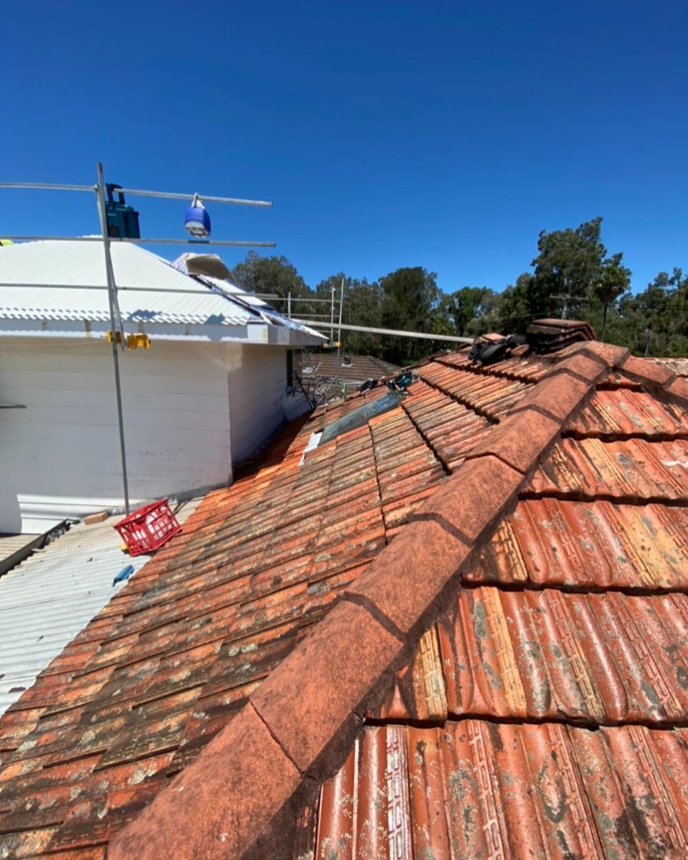 A Close Up of a Roof With a Blue Sky in the Background — Lake Valley Roofing in Fennell Bay, NSW
