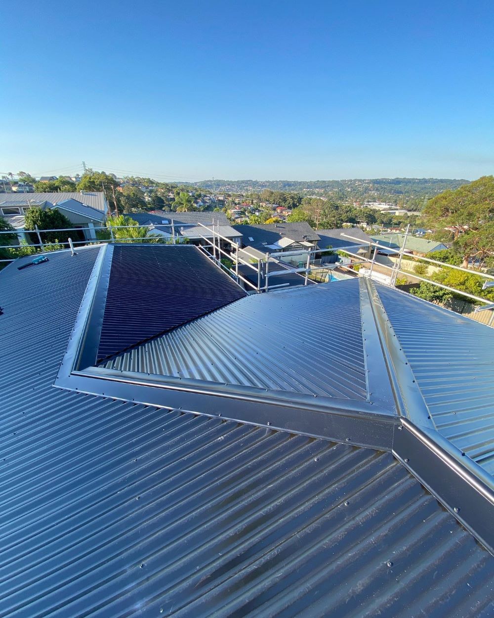 A Close Up of a Roof With a Blue Sky in the Background — Lake Valley Roofing in Wangi Wangi, NSW
