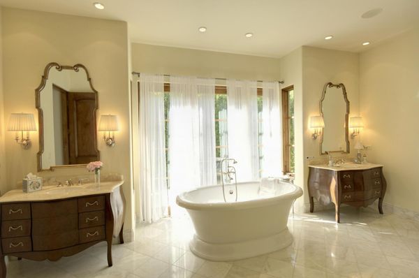 bathtub beside the window