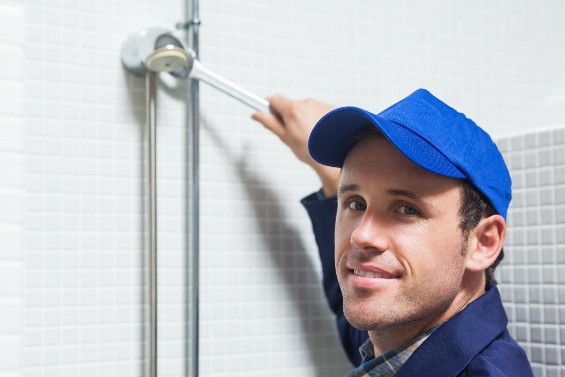 worker holding the wrench