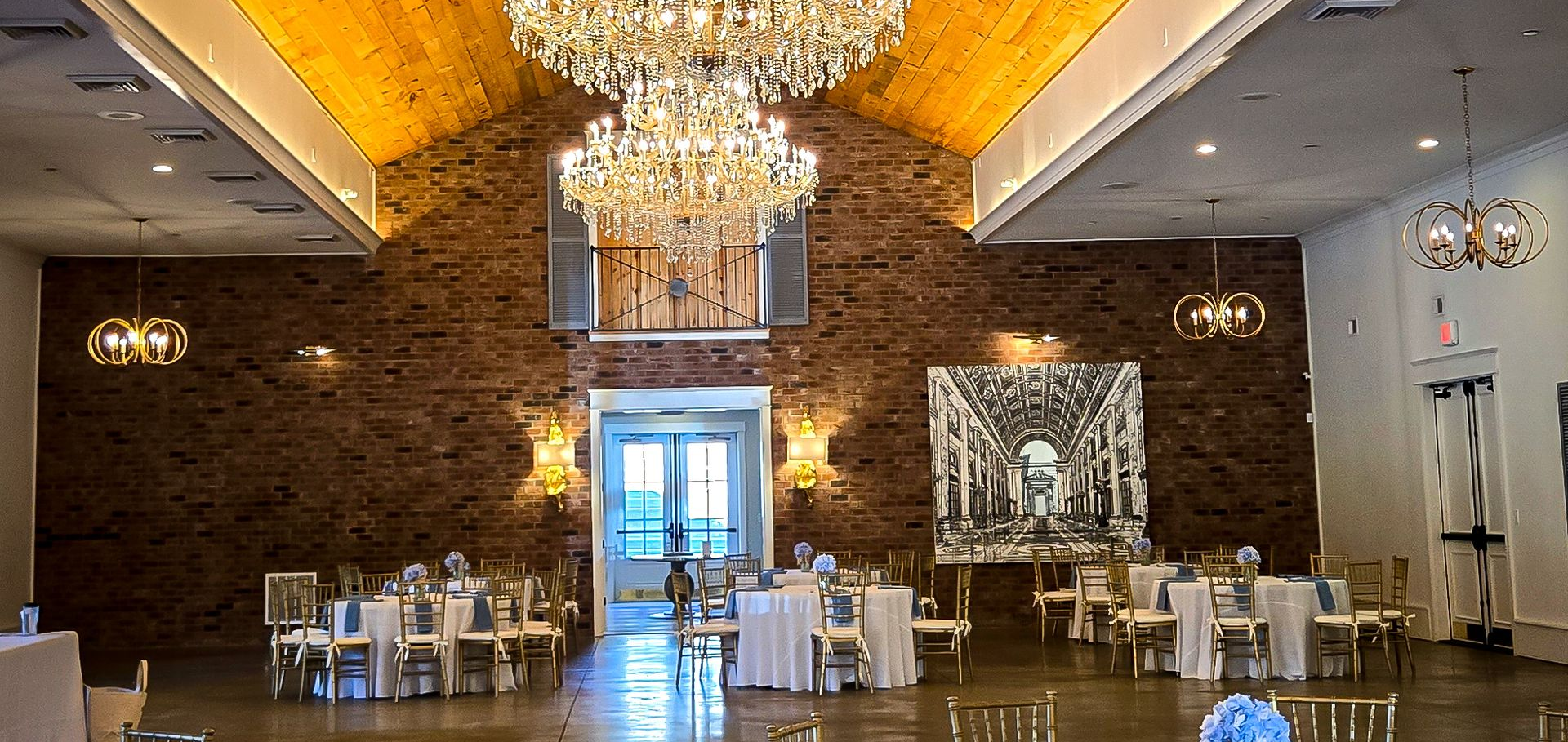 Hazelnut Farm barn ballroom with pine ceiling and crystal chandeliers, Fisherville, KY