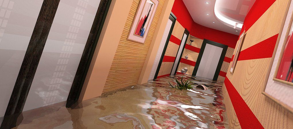 A hallway with a lot of water on the floor.