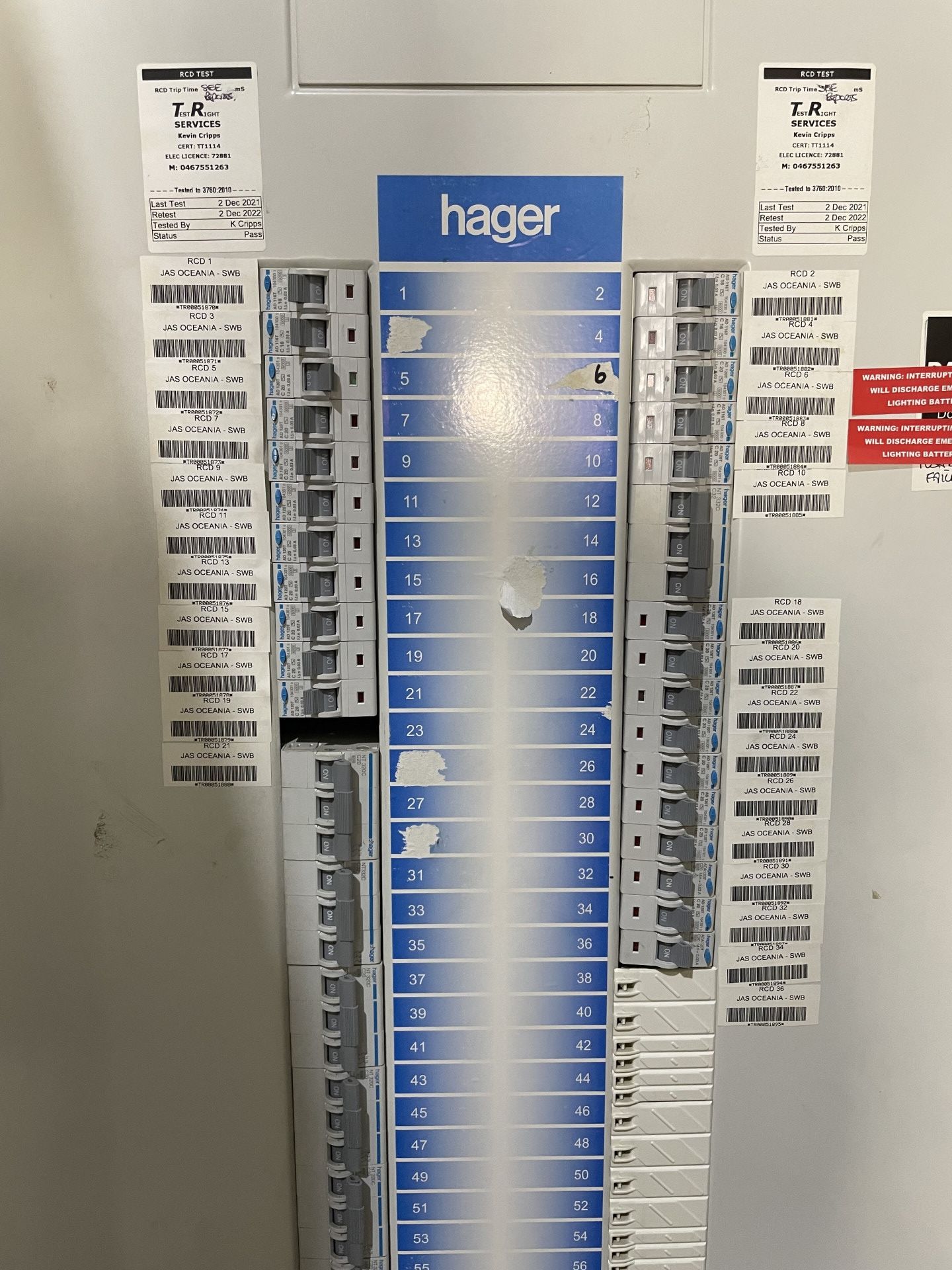 A Person Is Using a Multimeter to Test a Circuit Board — Test Right Services in Ingham, QLD