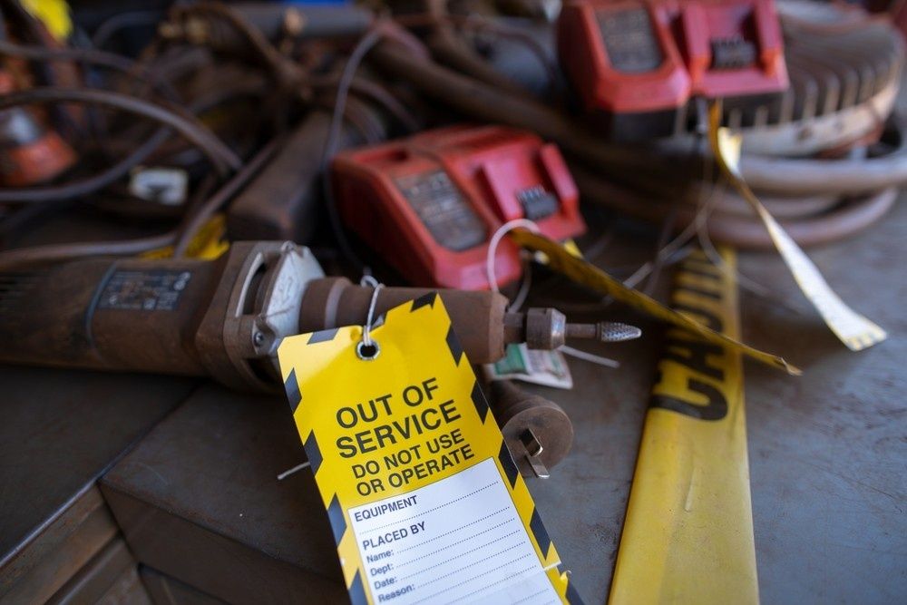 A Power Tool on A Cluttered Work Surface — Test Right Services in Townsville, QLD