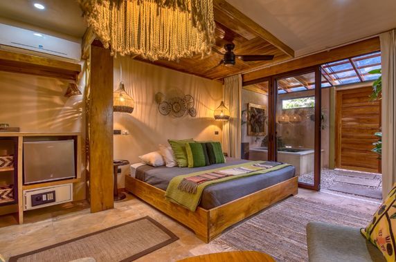 There is a large bed in the middle of the room.