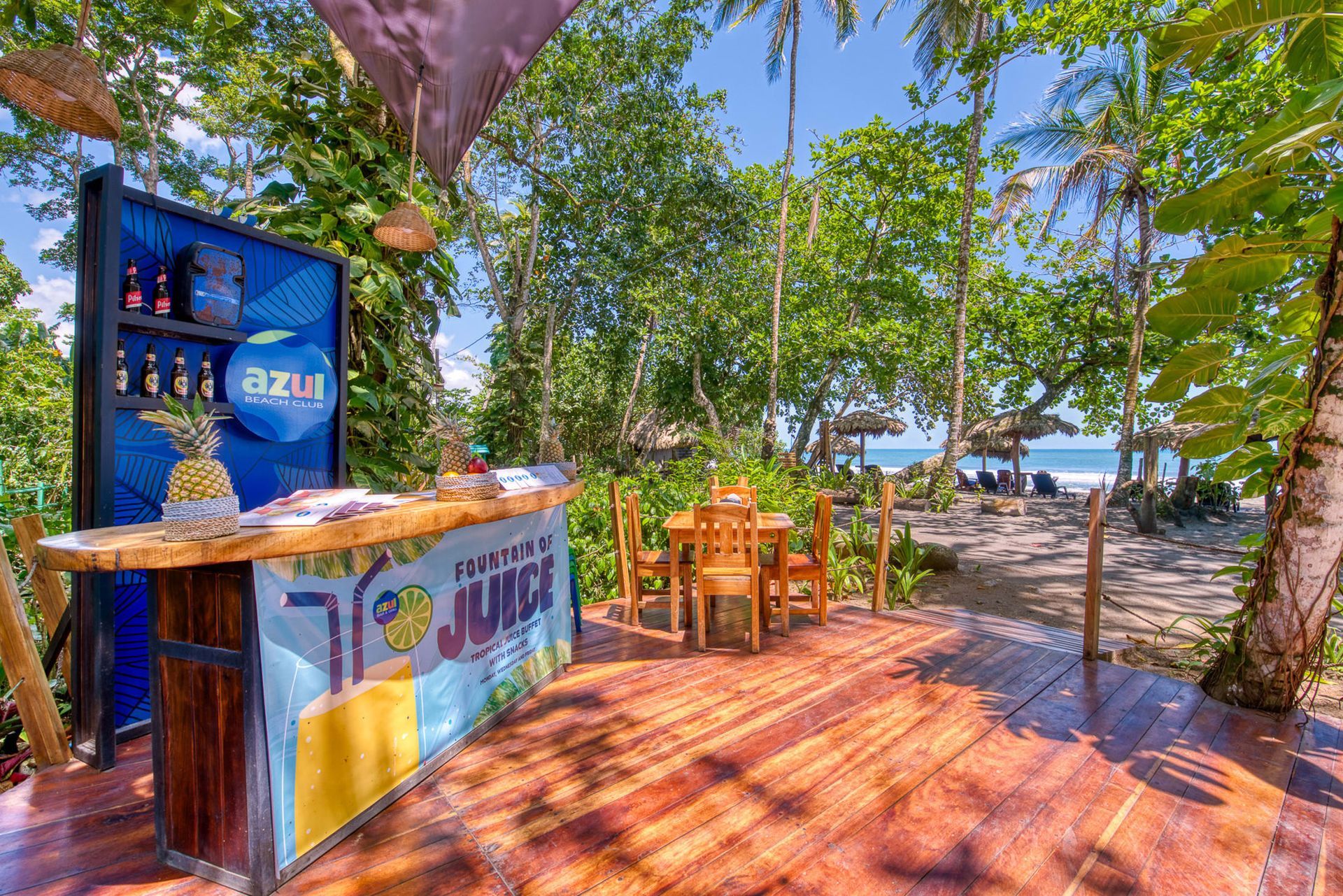 A bar with a sign that says juice on it