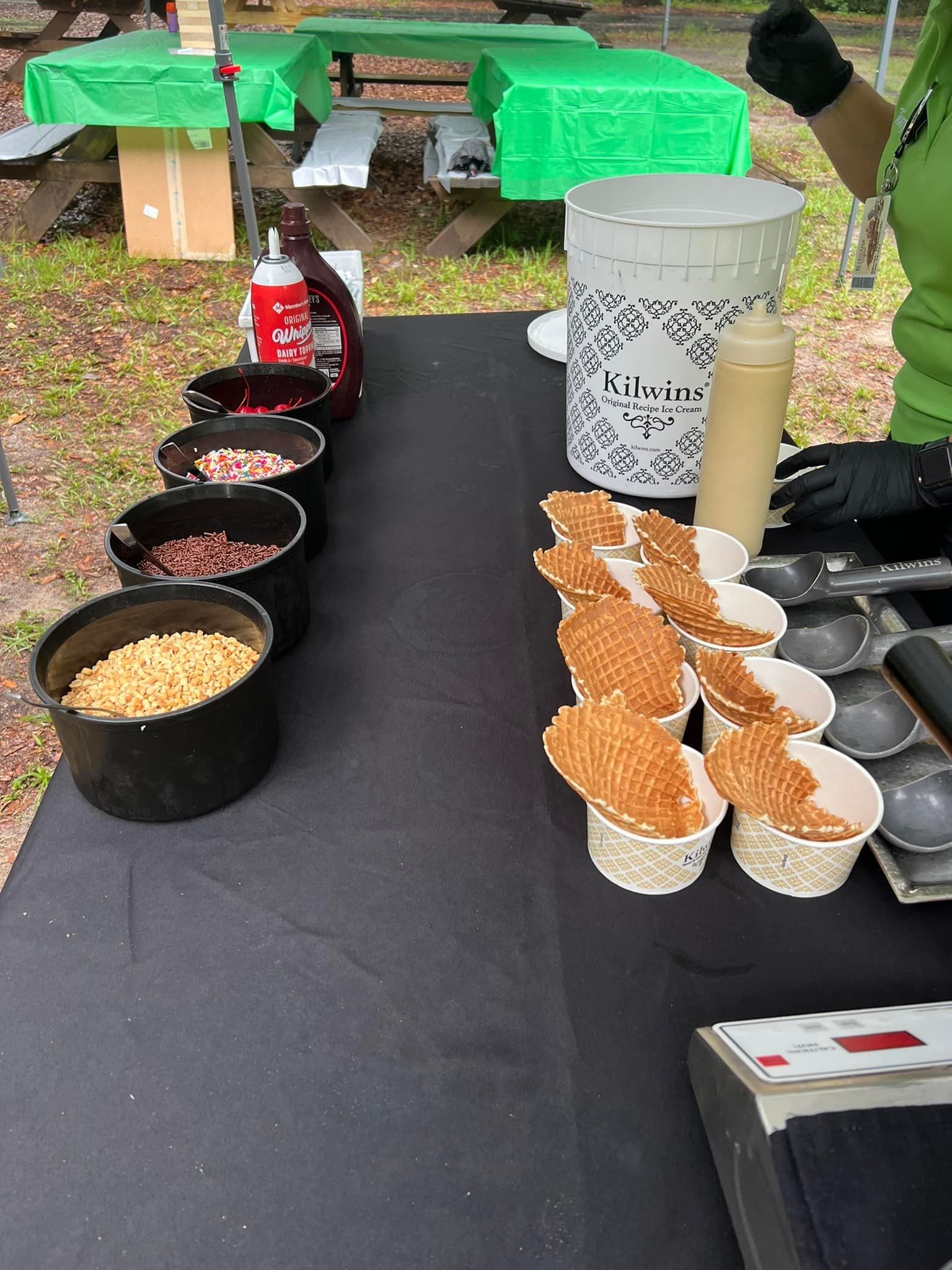 A table topped with bowls of food and condiments.