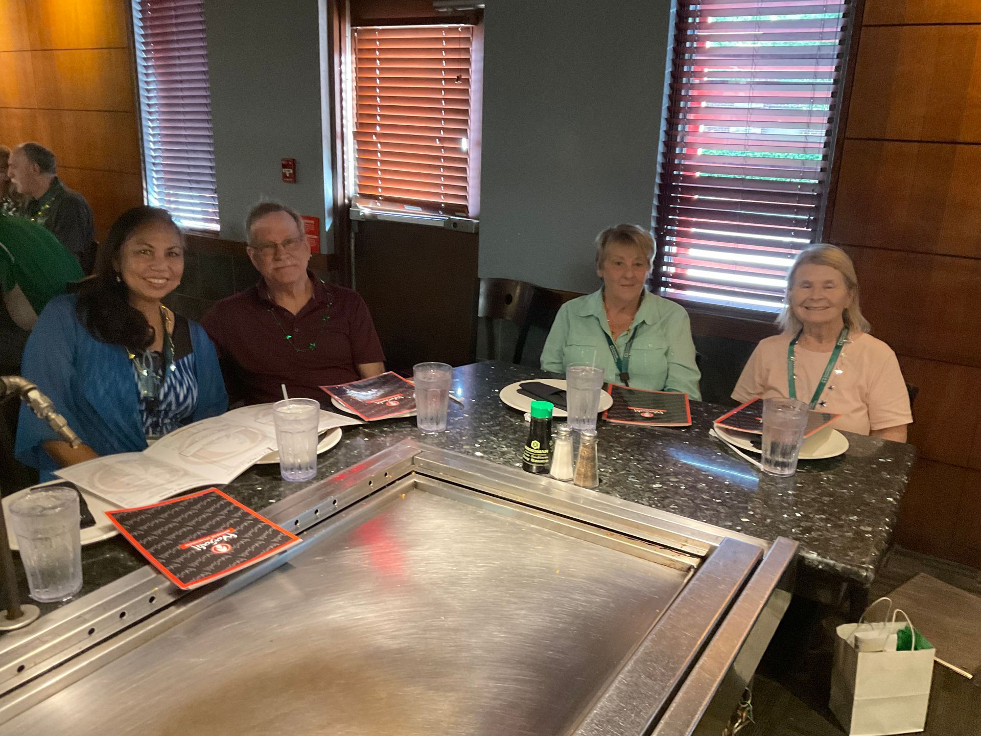 Summerlin clients are sitting around the table preparing to order