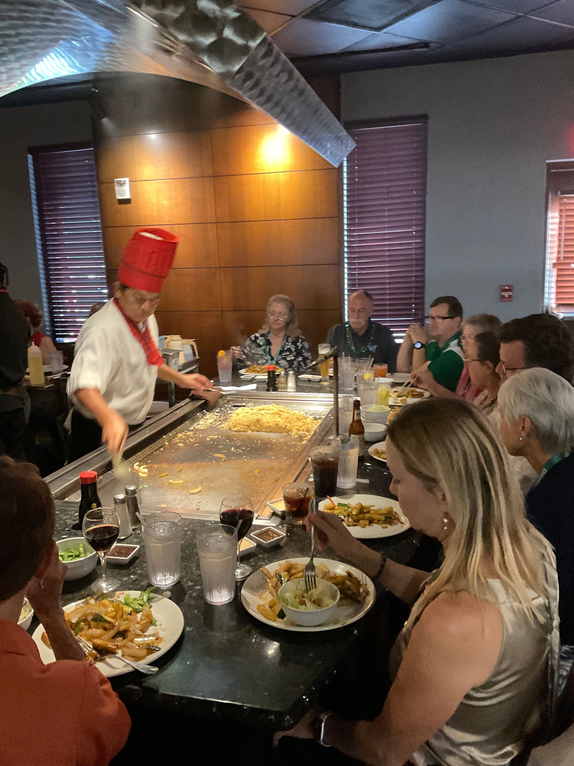 Summerlin clients are watching the chef prepare the hibachi meal
