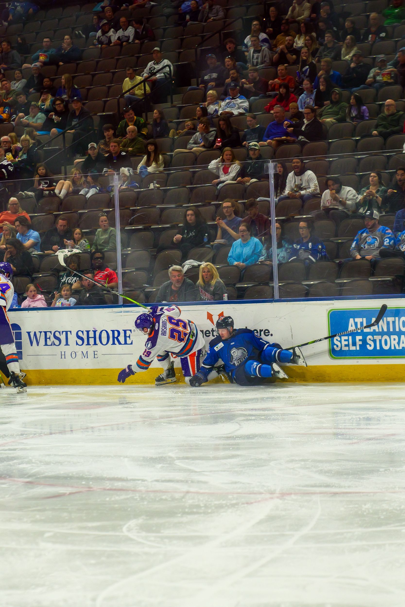 A hockey game is being played at the west shore stadium