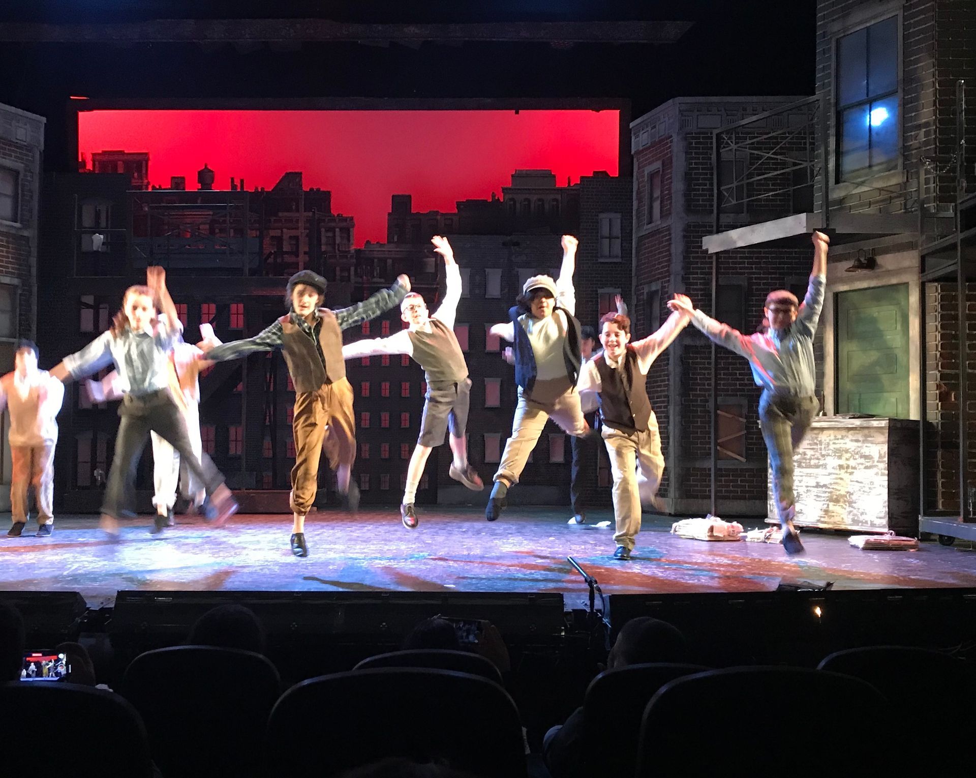 Children Dancing in Local Production of Newsies