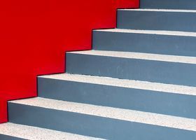 Abstract staircase pattern in warm colours, ascending steps