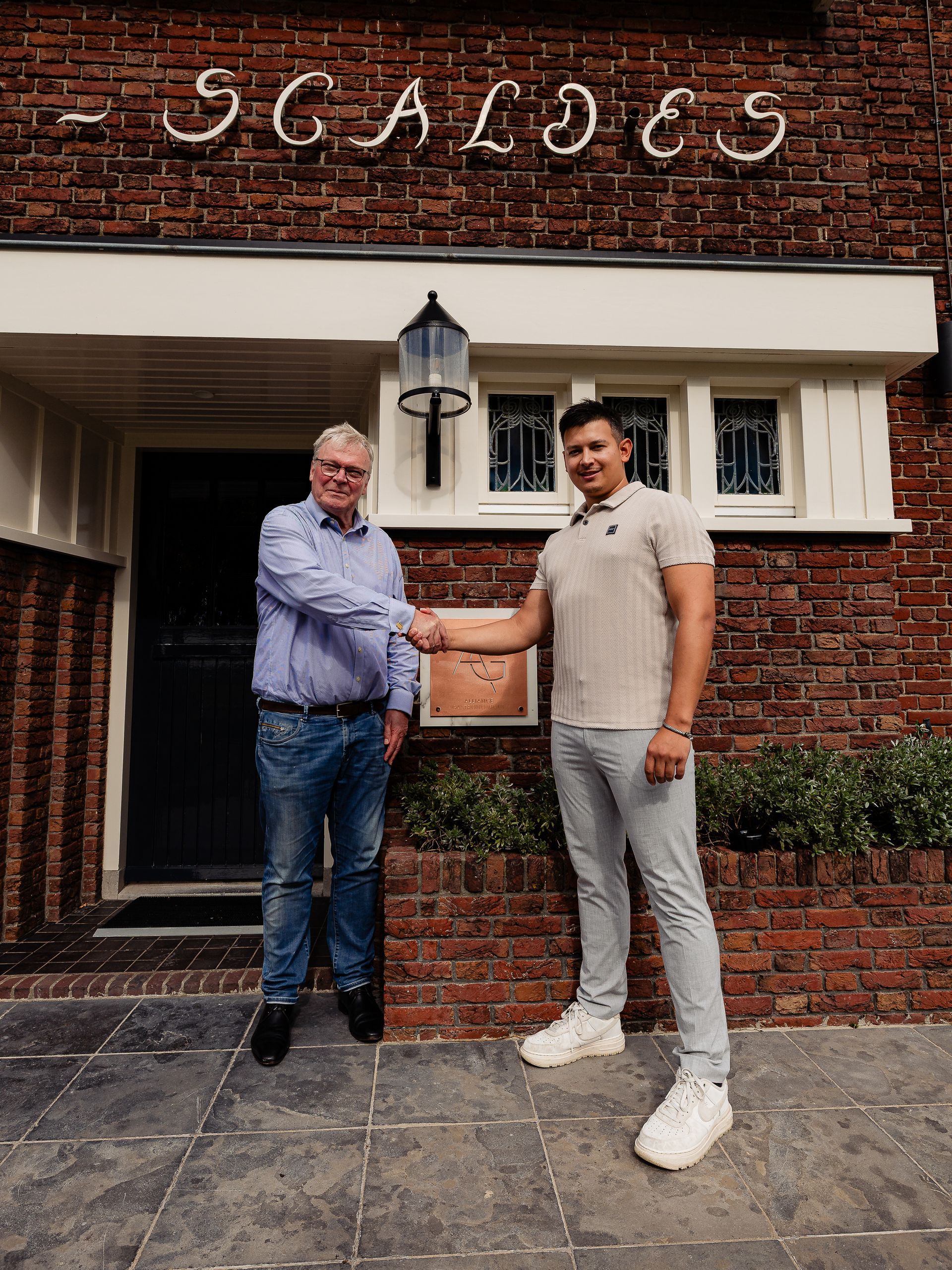 Eigenaar New Challenge met voorzitter van Alliance Gastronomique