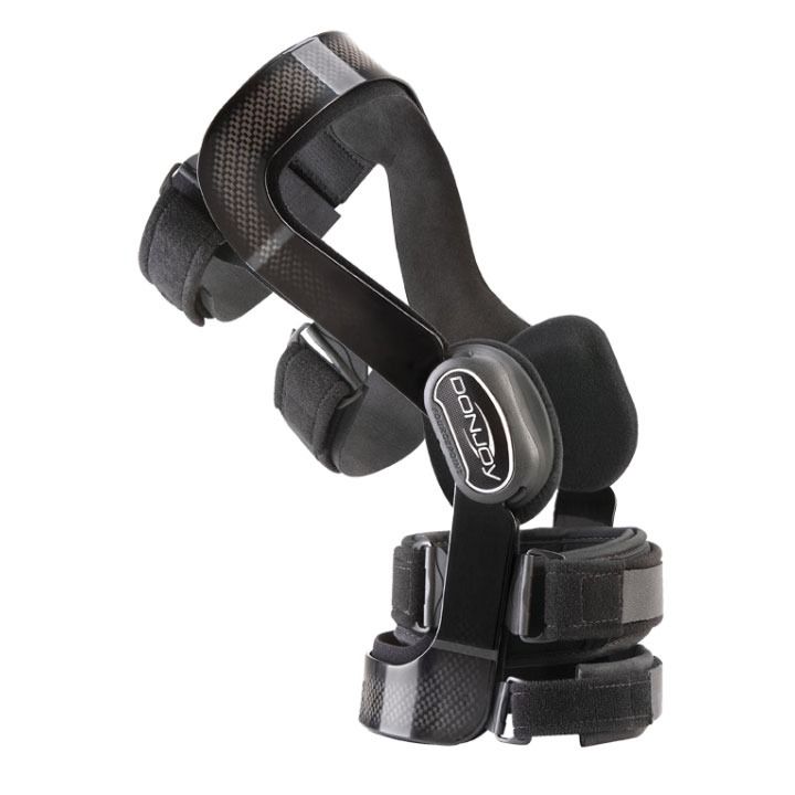 Black adjustable wrist and hand brace with padded straps and a thumb support on a white background