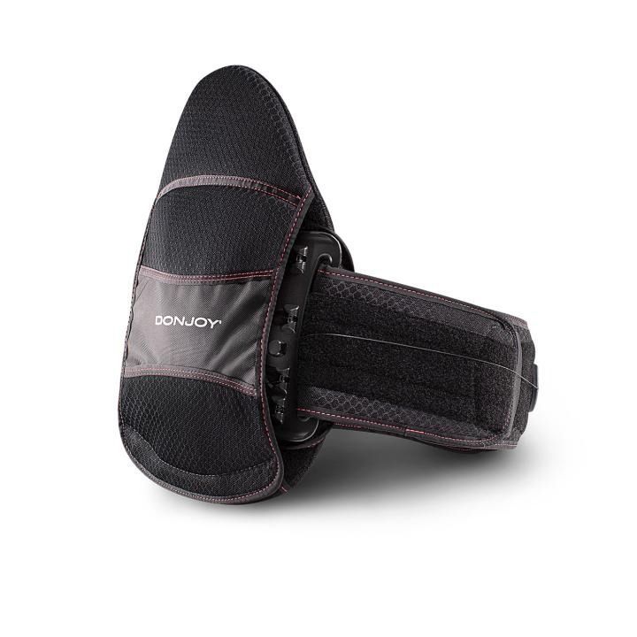 Black and gray fabric wrist brace with a velcro strap on a white background