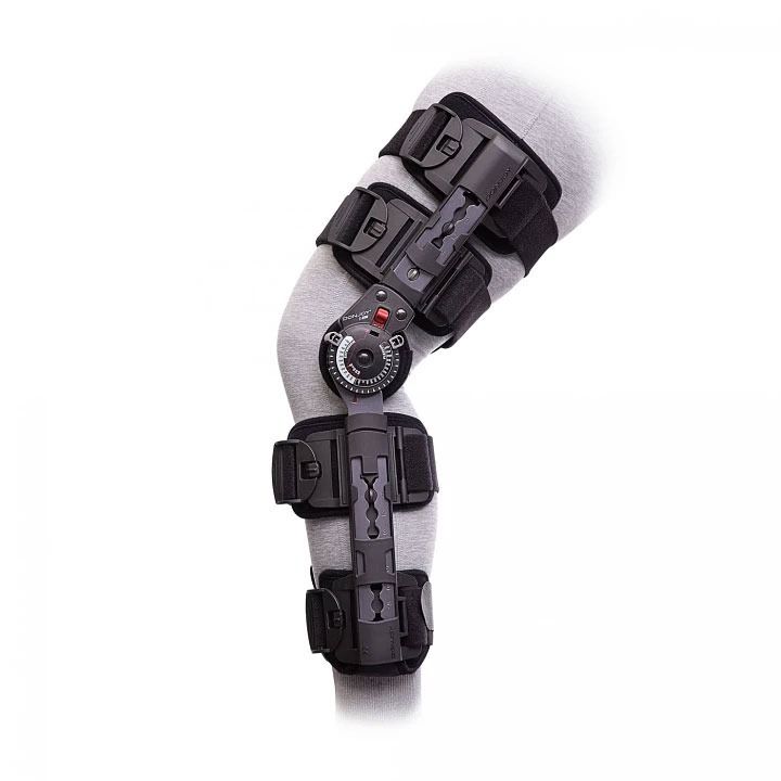 Black adjustable knee brace with metal hinge and straps on a white background