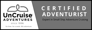 The logo for uncruise adventures is a certified adventurer